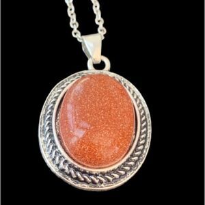 Red Goldstone Oval Pendant Necklace Balinese Style Aventurine Glass
